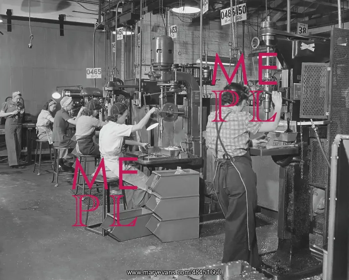 : Women drill press operators working in a west : Women drill press operators working in a west