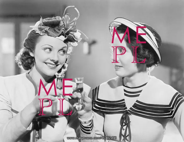  : Two women drinking a schnapps