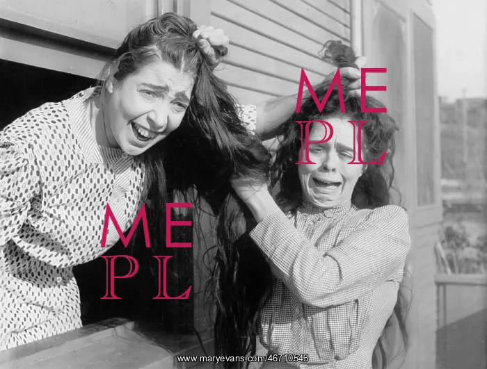 : Two women fighting and pulling each others hair : Two women fighting and pulling each others hair