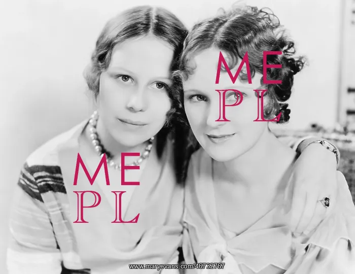 : Two women holding each other close : Two women holding each other close