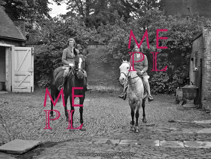  : Two women on horseback in stable yard