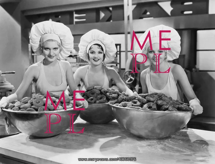 : Three women with huge bowls of donuts : Three women with huge bowls of donuts