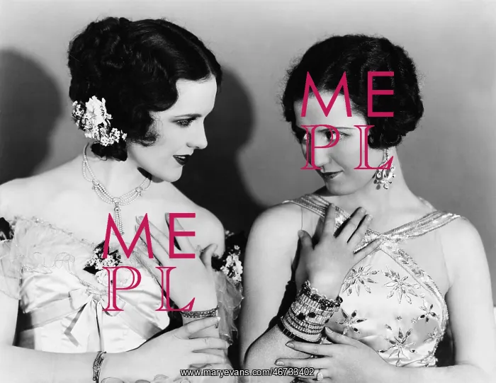 : Two women imitating each other : Two women imitating each other