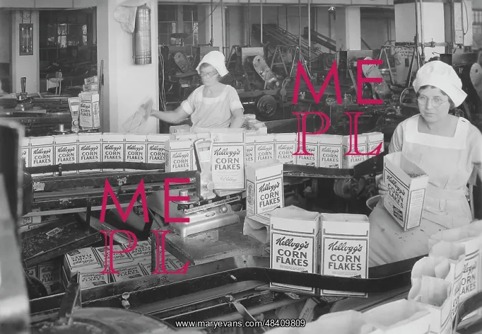 : Women inspecting filled boxes of cereal before : Women inspecting filled boxes of cereal before