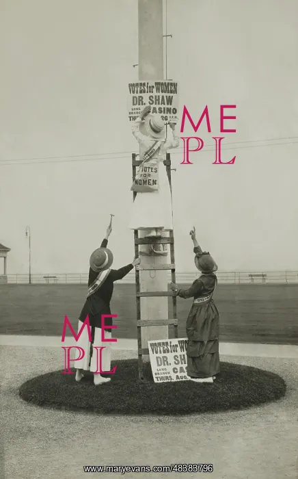 : Three women installing a sign advertising a suffrage event : Three women installing a sign advertising a suffrage event