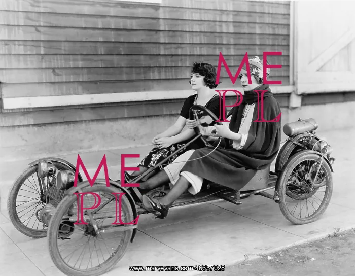 : Two women in go kart : Two women in go kart