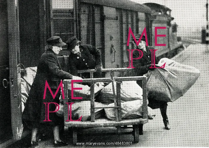 : Women load mail train at London terminus, WW2 : Women load mail train at London terminus, WW2
