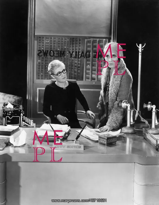 : Two women in an office : Two women in an office
