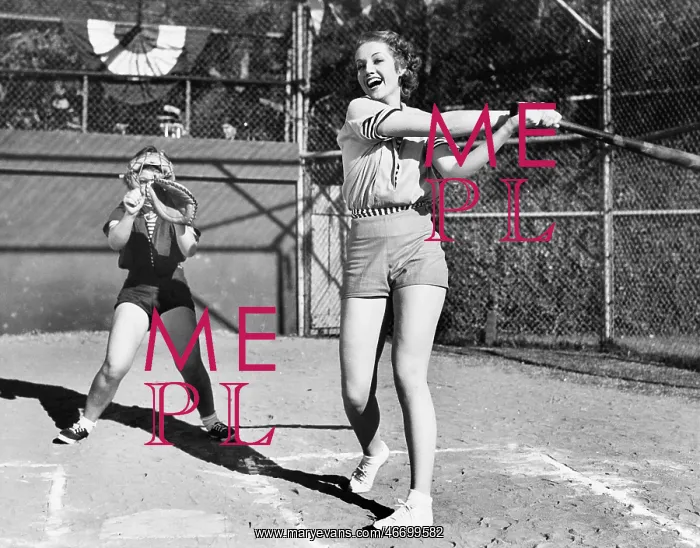 : Two women playing baseball : Two women playing baseball