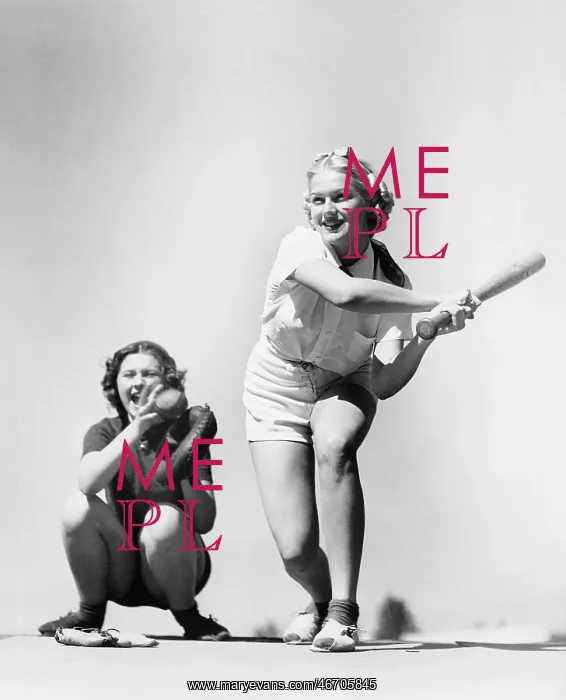 : Two women playing baseball : Two women playing baseball