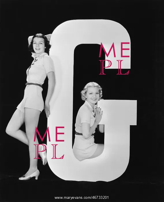 : Women posing with huge letter G : Women posing with huge letter G