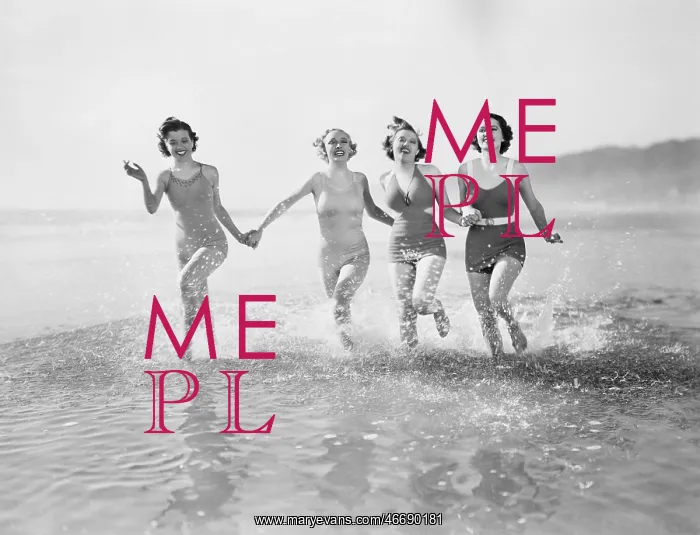 : Four women running in water on the beach : Four women running in water on the beach