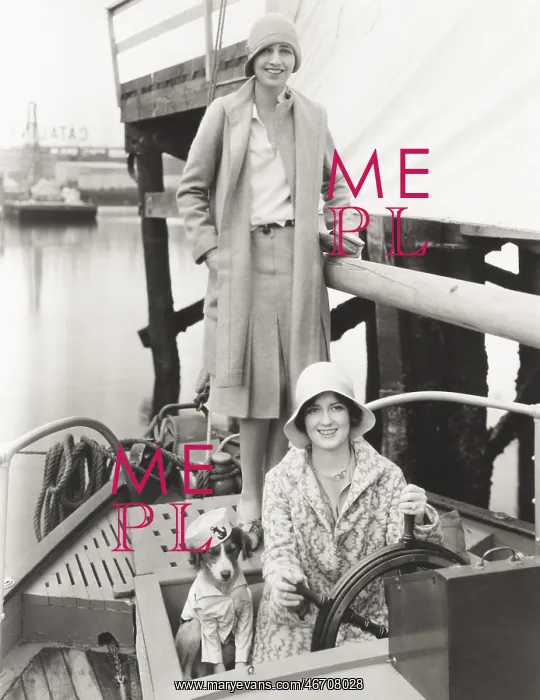  : Two women out sailing with their mascot