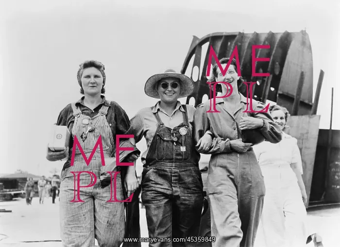 : Three women shipyard workers on their lunch break : Three women shipyard workers on their lunch break