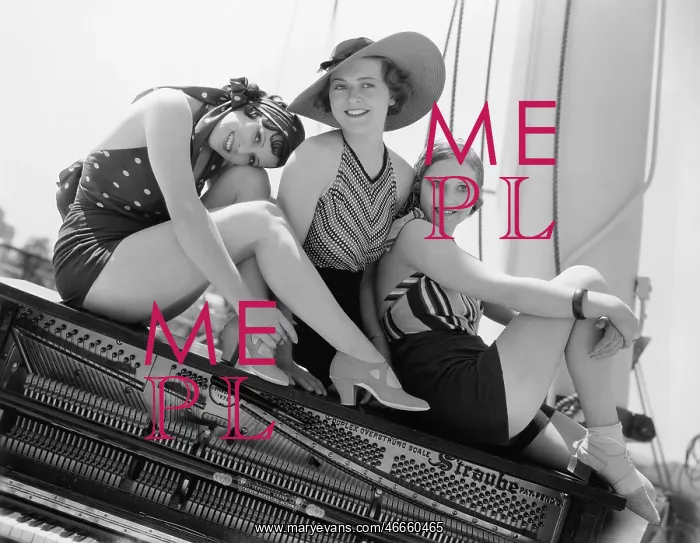 : Three women sitting on top of a piano : Three women sitting on top of a piano