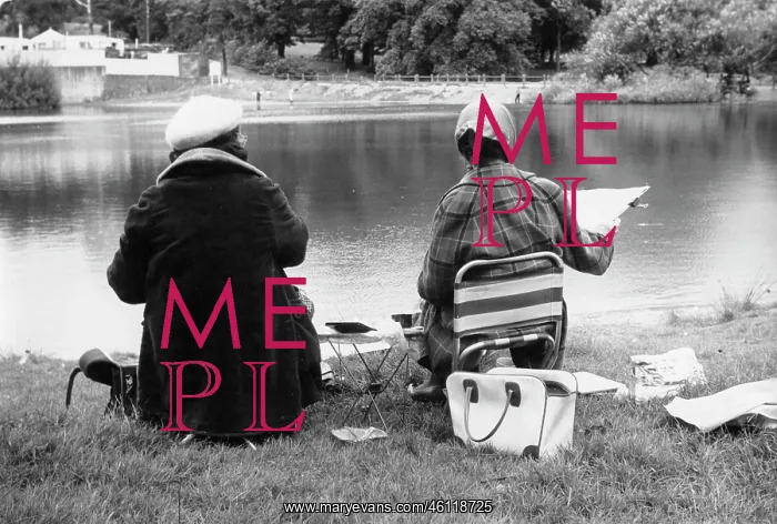 : Two women sketching by a pond : Two women sketching by a pond
