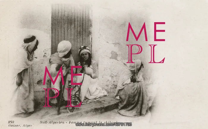  : Women smoking a Chibouk Pipe - Southern Algeria