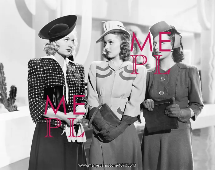 : Three women standing side by side : Three women standing side by side