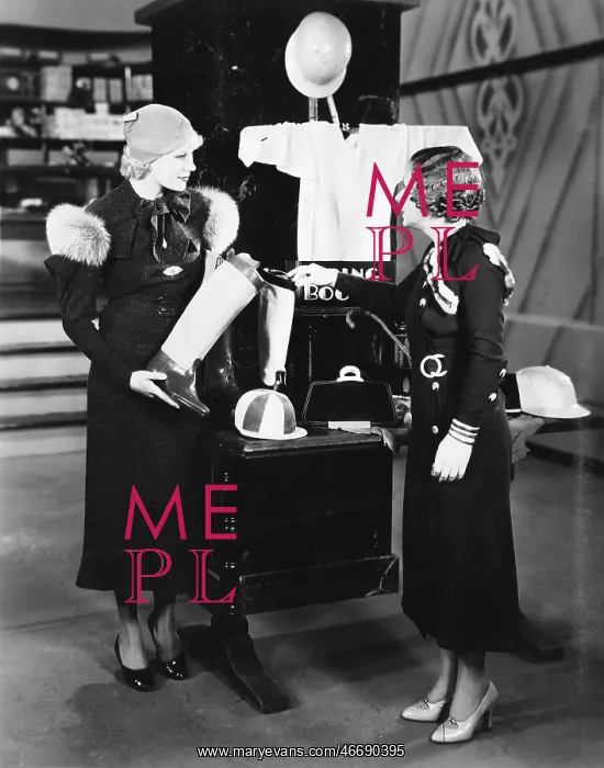 : Two women in a store looking at the display : Two women in a store looking at the display