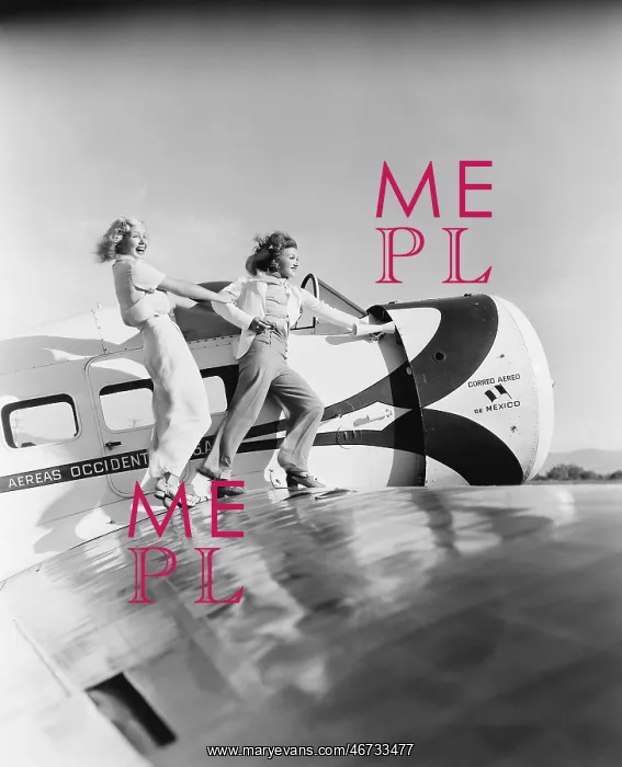 : Two women walking on the wing of a plane : Two women walking on the wing of a plane