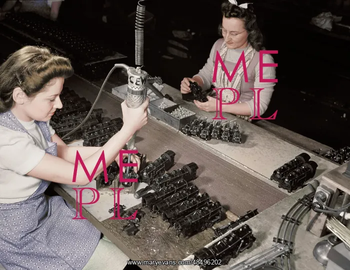  : Women workers using an electric screwdriver