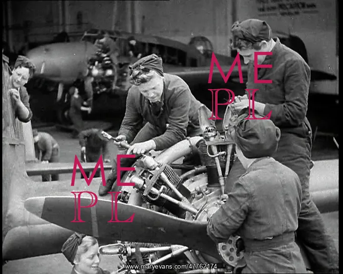 : Women Working on an Aeroplane Engine : Women Working on an Aeroplane Engine