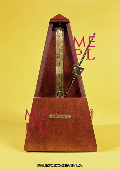 : Wooden and brass metronome : Wooden and brass metronome