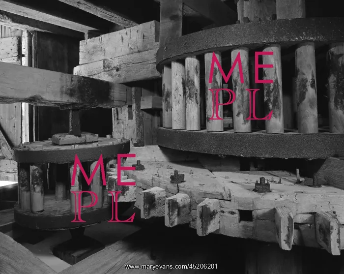 : Wooden gears inside an old tide mill. The ? : Wooden gears inside an old tide mill. The ?