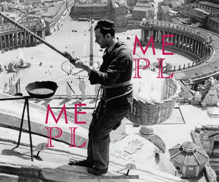  : A worker at the fascade of St. Peter's Basilica