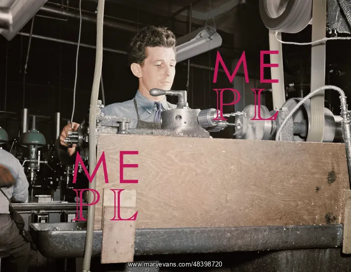 : Worker operating at a turret lathe at the : Worker operating at a turret lathe at the