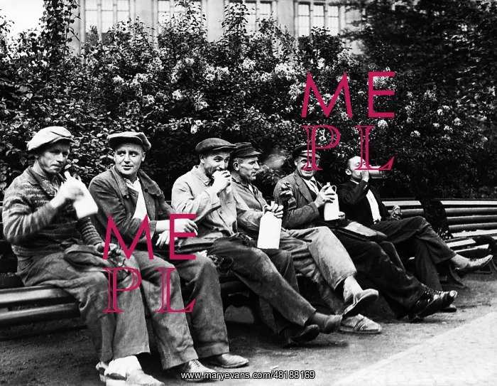 : Workers during their breakfast time, 1938 : Workers during their breakfast time, 1938