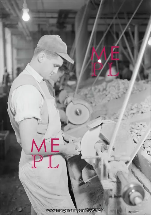 : Workers buffing rubber doll bodies, 1936 : Workers buffing rubber doll bodies, 1936