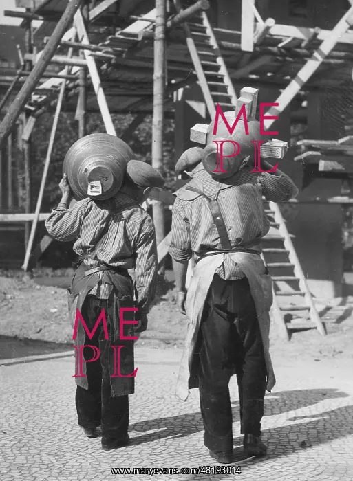 : Workers carry bells to the construction site, 1935 : Workers carry bells to the construction site, 1935