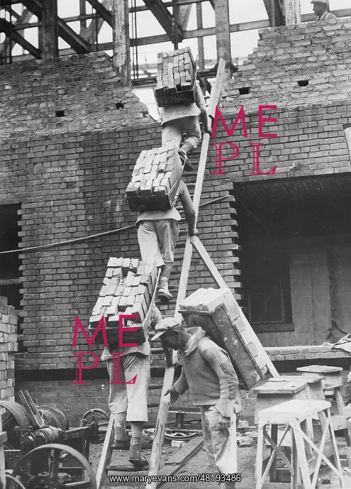 : Workers carry bricks, 1939 : Workers carry bricks, 1939