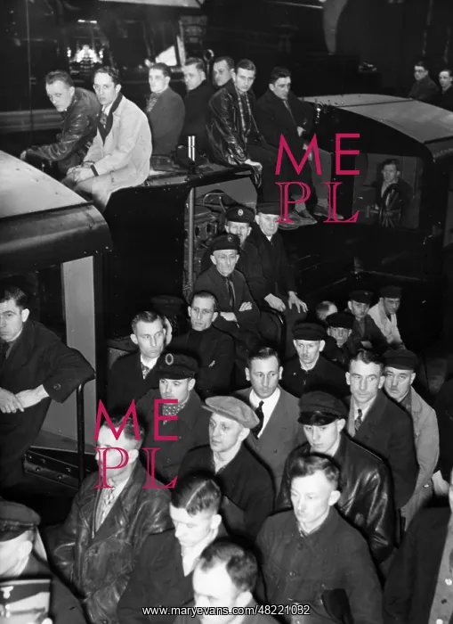 : Workers listen to the speech of Hitler at their workplac : Workers listen to the speech of Hitler at their workplac