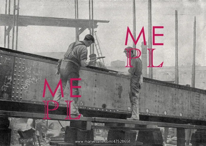 : Workers riveting a girder at a Sunderland shipyard : Workers riveting a girder at a Sunderland shipyard