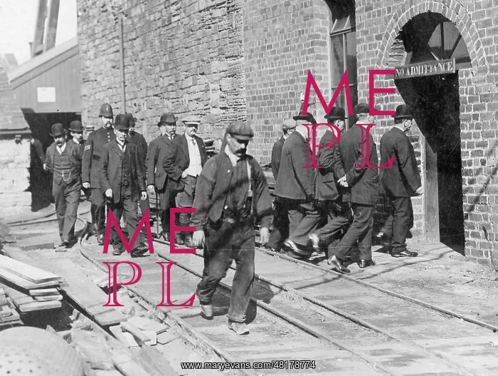 : Workers go to work during a strike in England, 1910 : Workers go to work during a strike in England, 1910