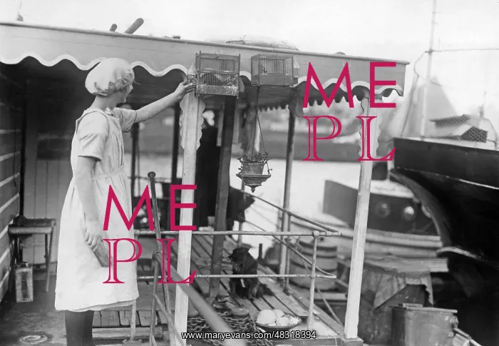 : Working class woman on a barge that is used as a dwelling : Working class woman on a barge that is used as a dwelling
