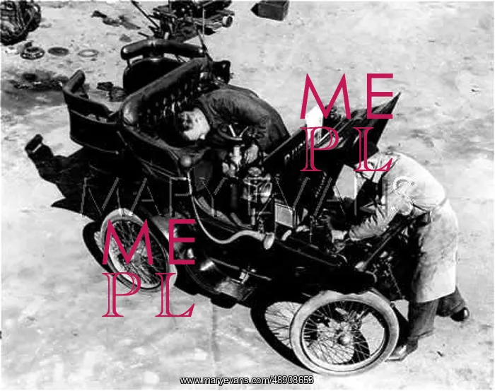 : WORKING ON A MOTOR CAR : WORKING ON A MOTOR CAR