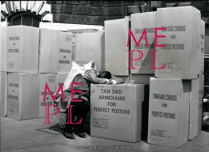 : Workman with boxes of perfect posture armchairs : Workman with boxes of perfect posture armchairs