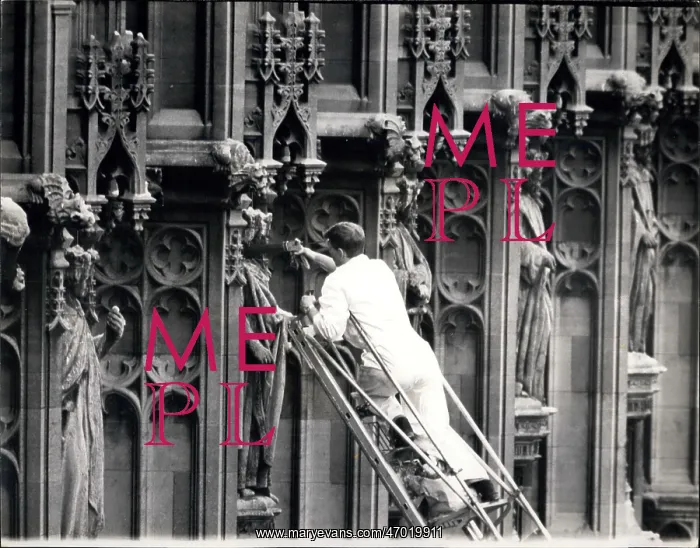: Workman preventing pigeons from perching, Westminster : Workman preventing pigeons from perching, Westminster