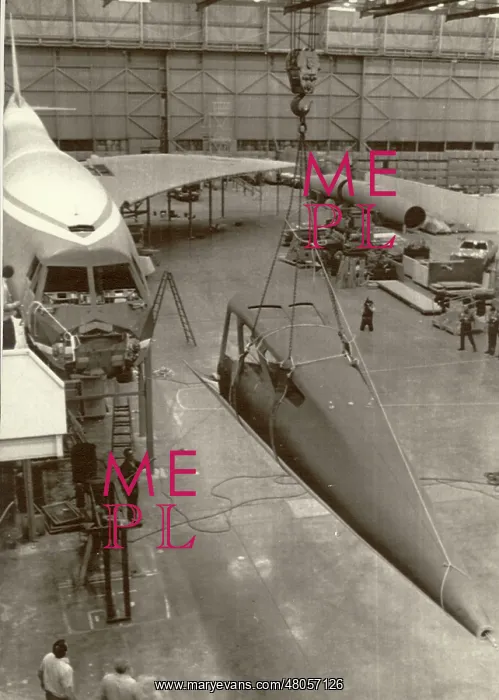 : Workmen begin the job of dismantling the Boeing mock-up : Workmen begin the job of dismantling the Boeing mock-up