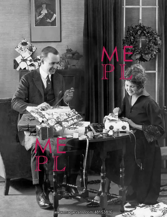 : Wrapping Christmas presents, 1926 : Wrapping Christmas presents, 1926