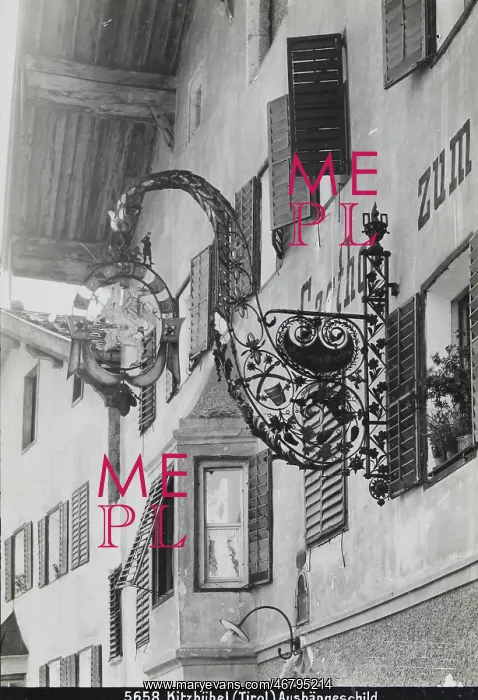 : Wrought iron sign on a tavern : Wrought iron sign on a tavern