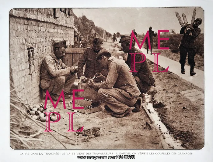 : WW1 - Soldiers checking the pins in hand grenades : WW1 - Soldiers checking the pins in hand grenades