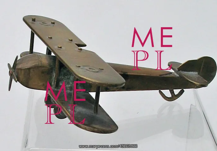 : WWI biplane with machine-made roundels on wings : WWI biplane with machine-made roundels on wings