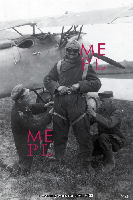 : WWI, German Pilot Being Fitted with Parachute : WWI, German Pilot Being Fitted with Parachute