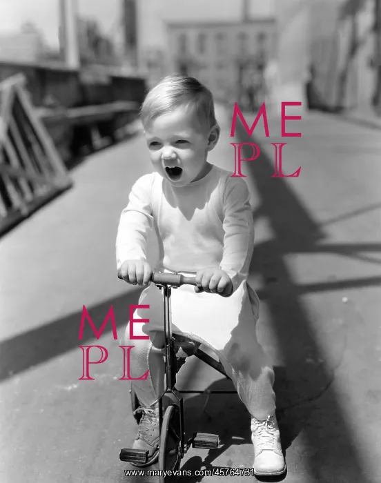  : Yawning boy riding tricycle