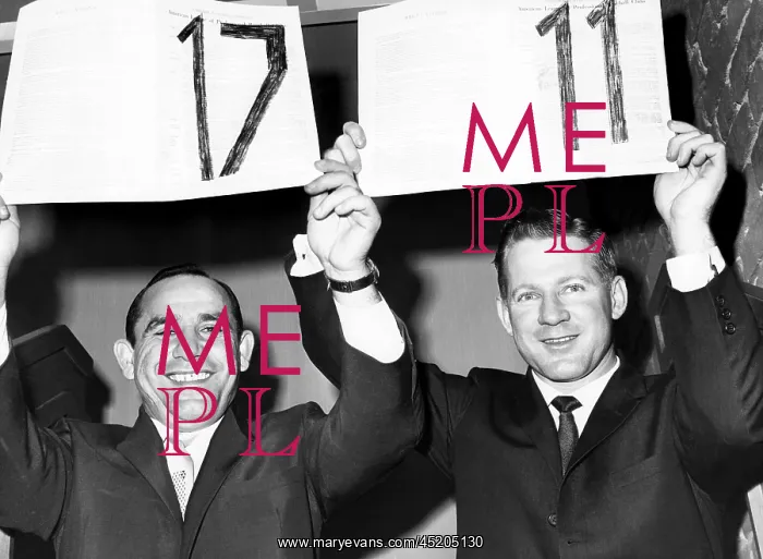 : Yogi Berra and Whitey Ford hold up their ? : Yogi Berra and Whitey Ford hold up their ?
