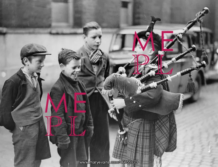 : Young bagpipe player : Young bagpipe player